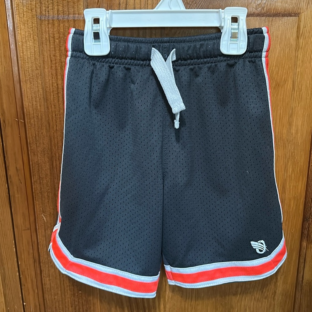 Grey shorts with orange and white stripes